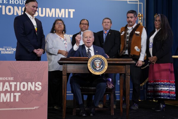 President Joe Biden speaks before signing an executive order at the White House Tribal Nations Summit at the Department of the Interior, Wednesday, Dec. 6, 2023, in Washington. (AP Photo/Evan Vucci)