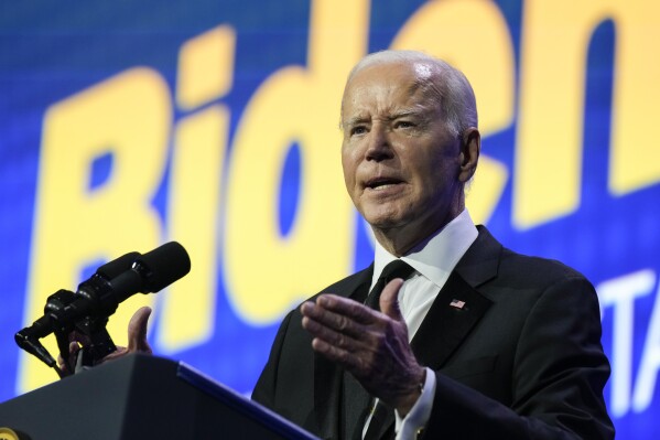 President Joe Biden speaks at the 2023 Human Rights Campaign National Dinner, Saturday, Oct. 14, 2023, in Washington. (AP Photo/Manuel Balce Ceneta)