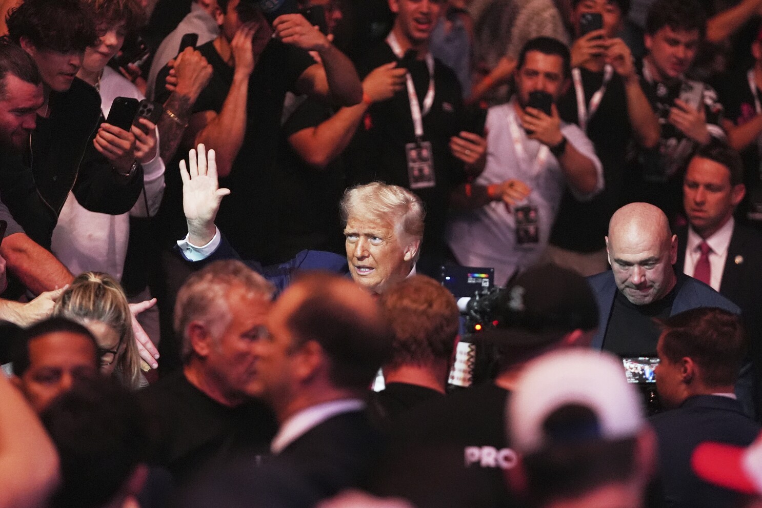 Trump attends UFC championship fight in New Jersey, taking a break from Musk feud for cage fights