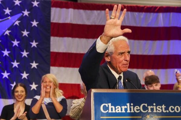 U.S. Rep. Charlie Crist addresses supporters after he is announced the winner of his primary at his watch party in the Grand Bay Ballroom of the Hilton St. Petersburg Bayfront Hotel, on Tuesday, Aug. 23, 2022, in St. Petersburg, Fla. Crist defeated Agriculture Commissioner Nikki Fried in Florida's closely watched gubernatorial primary. (Dirk Shadd/Tampa Bay Times via AP)