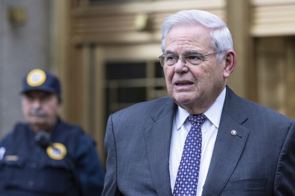 U.S. Sen. Bob Menendez, D-N.J., leaves the Manhattan federal court after the second day of jury selection in his trial, Tuesday, May, 14, 2024, in New York. The Democrat has pleaded not guilty to bribery, extortion, fraud and obstruction of justice, along with acting as a foreign agent of Egypt. (AP Photo/Stefan Jeremiah)