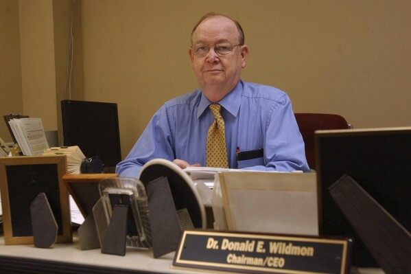 American Family Radio's Don Wildmon sits at his desk in his Tupelo, Miss., office March 3, 2005. Wildmon, the founder of the American Family Association, a conservative Christian advocacy group, has died, the organization announced Thursday, Dec. 28, 2023. The 85-year-old Mississippi native died Thursday from complications related to Lewy body dementia, an obituary published by WTVA-TV said. (C. Todd Sherman/The Northeast Mississippi Daily Journal via AP)