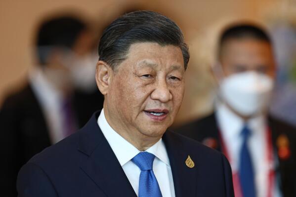 FILE - China's President Xi Jinping arrives to attend the APEC Economic Leaders Meeting during the Asia-Pacific Economic Cooperation, APEC summit, Nov. 19, 2022, in Bangkok, Thailand. The CIA director says U.S. intelligence shows that China’s President Xi Jinping has instructed his country’s military to “be ready by 2027” to invade Taiwan. But CIA Director William Burns also says Xi may be currently harboring doubts about his ability to make a move against Taiwan, given Russia’s experience in its war with Ukraine. (Jack Taylor/Pool Photo via AP, File)