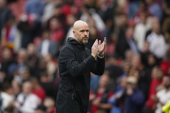 Manchester United's head coach Erik ten Hag applauds at the end of the English Premier League soccer match between Manchester United and Brighton and Hove Albion at Old Trafford stadium in Manchester, England, Saturday, Sept. 16, 2023. Brighton won 3-1. (AP Photo/Dave Thompson)