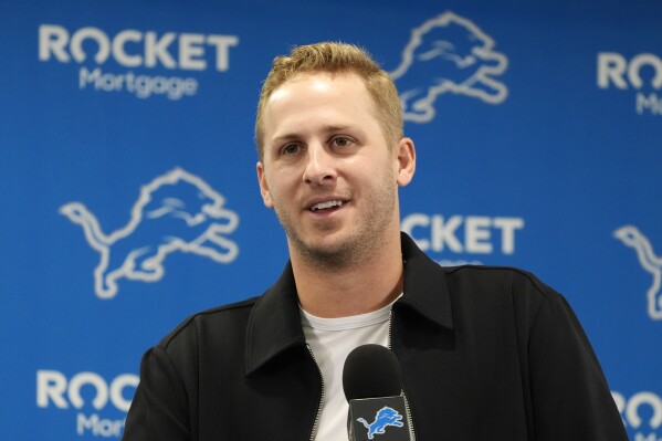 Detroit Lions quarterback Jared Goff addresses the media during an NFL football news conference, Thursday, May 16, 2024, in Allen Park, Mich. The Lions announced that they have signed Goff to a contract extension through the 2028 season. (AP Photo/Carlos Osorio)