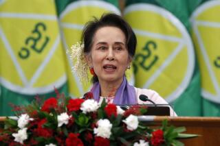 FILE - Myanmar's then leader Aung San Suu Kyi delivers a speech during a meeting on implementation of Myanmar Education Development in Naypyitaw, Myanmar, on Jan. 28, 2020. The political party led by Myanmar's ousted leader Aung San Suu Kyi is expected to face automatic dissolution by the military-appointed election commission on midnight Tuesday, March 28, 2023, because it declined to register for a planned general election it denounced as a sham. (AP Photo, File)