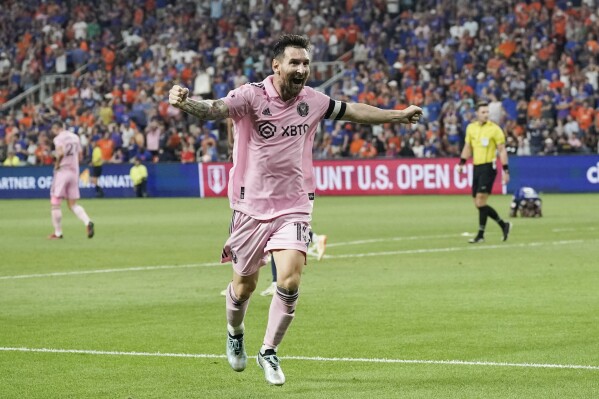 Inter Miami forward Lionel Messi celebrates after a game-tying goal in the 90th minute from teammate Leonardo Campana, not pictured, during the second half of a U.S. Open Cup semifinal soccer match against FC Cincinnati, Wednesday, Aug. 23, 2023, in Cincinnati. (AP Photo/Joshua A. Bickel)
