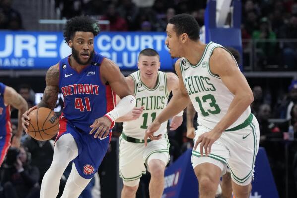 Detroit Pistons forward Saddiq Bey (41) brings the ball up court during the second half of an NBA basketball game against the Boston Celtics, Monday, Feb. 6, 2023, in Detroit. (AP Photo/Carlos Osorio)