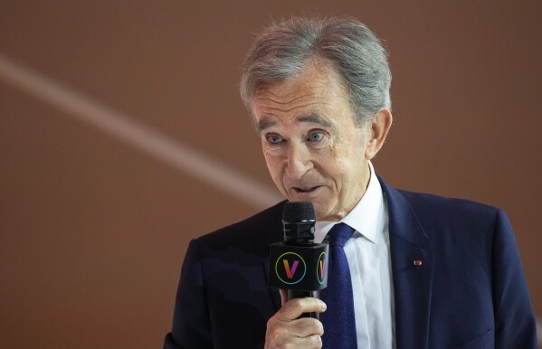 FILE - LVMH luxury group CEO Bernard Arnault speaks during an event at the Vivatech show in Paris, June 15, 2023. The world could have its first trillionaire within a decade, anti-poverty organization Oxfam International said Monday Jan. 15, 2024 in its annual assessment of global inequalities timed to the gathering of political and business elites at the Swiss ski resort of Davos. (AP Photo/Michel Euler, File)