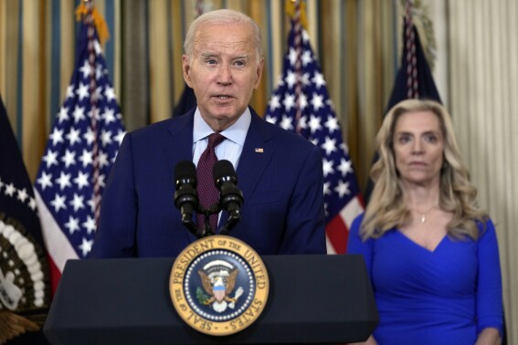 President Joe Biden speaks during a meeting of his Competition Council in the State Dining Room of the White House, Tuesday, July 19, 2023 in Washington, as Lael Brainard, director of the National Economic Council, listens. (AP Photo/Manuel Balce Ceneta)