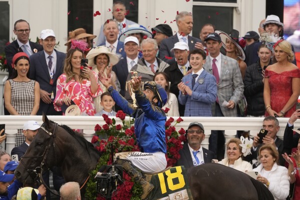 Jockey Junior Alvarado celebrates after riding Sovereignty to victory in the 151st running of the Kentucky Derby horse race at Churchill Downs Saturday, May 3, 2025, in Louisville, Ky. (AP Photo/Abbie Parr)