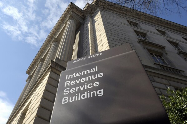  FILE - Tthe exterior of the Internal Revenue Service (IRS) building in Washington, on March 22, 2013. While taxpayer services have vastly improved, the IRS is still too slow to resolve identity theft cases, according to a new report released Wednesday, June 26, by an independent watchdog within the agency.(AP Photo/Susan Walsh, File)