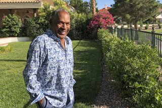 This photo provided by Didier J. Fabien shows O.J. Simpson in the garden of his Las Vegas area home on Monday, June 3, 2019. After 25 years living under the shadow of one of the nation’s most notorious murder cases, Simpson says his life now is fine. (Didier J. Fabien via AP)