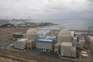 FILE - Nuclear power plants, Kori 1, right, and Shin Kori 2 are seen in Ulsan, South Korea, Feb. 5, 2013. South Korea has signed a 3 trillion won ($2.25 billion) deal with a Russian state-run nuclear energy company to provide components for Egypt's first nuclear power plant. (AP Photo/Ahn Young-joon, File)
