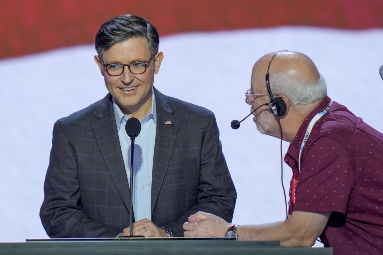 Speaker of the House Mike Johnson, R-La., smiles during a walkthrough for the Republican National Convention Sunday, July 14, 2024, in Milwaukee. (AP Photo/J. Scott Applewhite)