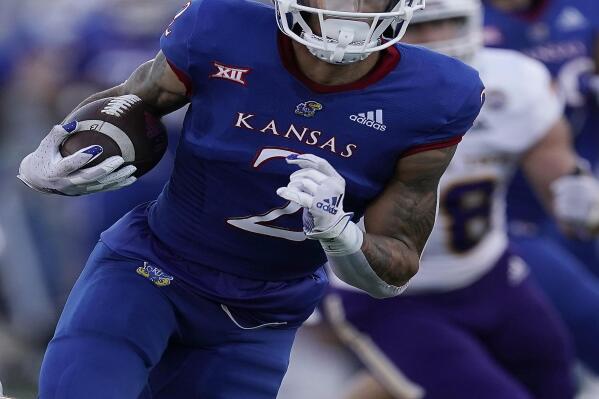 Kansas wide receiver Lawrence Arnold runs the ball during the first half of an NCAA college football game against Tennessee Tech Friday, Sept. 2, 2022, in Lawrence, Kan. (AP Photo/Charlie Riedel)