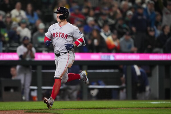 Tyler O'Neill homers for record-setting 5th straight opening day as Red Sox top Mariners 6-4 | AP News