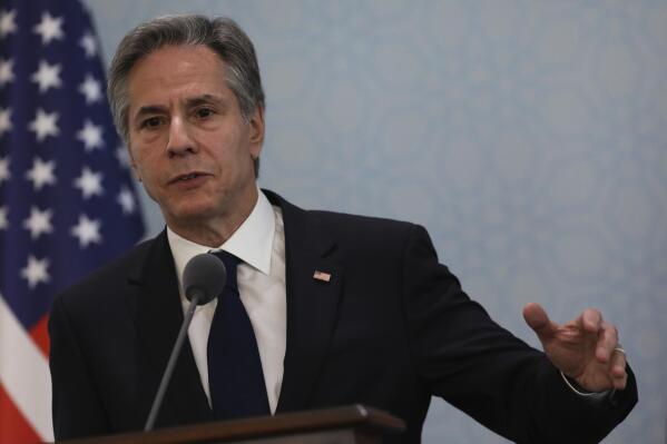 U.S. Secretary of State Antony Blinken talks to journalists during a joint news conference with Turkish Foreign Minister Mevlut Cavusoglu following their meeting in Ankara, Turkey, Monday, Feb. 20, 2023. (AP Photo/Burhan Ozbilici)