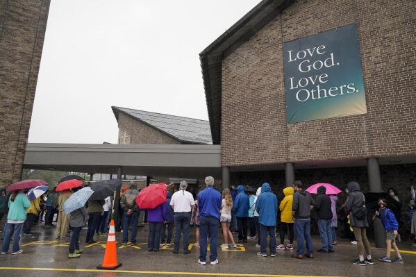 Churchgoers participate in a procession at the Holy Apostles Church in Milwaukee, Saturday, Sept. 12, 2020. For decades, Roman Catholic voters have been a pivotal swing vote in U.S. presidential elections, with a majority backing the winner, whether Republican or Democrat, nearly every time. (AP Photo/Morry Gash)