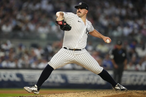 New York Yankees' Carlos Rodon pitches to a New York Mets batter during the fourth inning of a baseball game Wednesday, July 26, 2023, in New York. (AP Photo/Frank Franklin II)