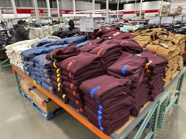 Shoppers peruse stacks of hoodies on display in a Costco warehouse Tuesday, Jan. 30, 2024, in Timnath, Colo. The Commerce Department releases U.S. retail sales data for January on Thursday, Feb. 15, 2024. (AP Photo/David Zalubowski)