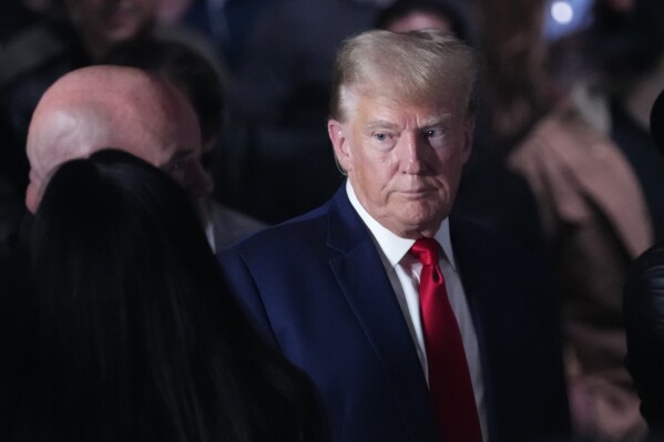 Former President Donald Trump arrives at the UFC 295 mixed martial arts event Saturday, Nov. 11, 2023, in New York. (AP Photo/Frank Franklin II)