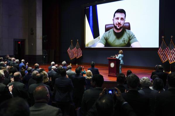 Ukrainian President Volodymyr Zelenskyy delivers a virtual address to Congress by video at the Capitol in Washington, Wednesday, March 16, 2022. (Sarah Silbiger, Pool via AP)