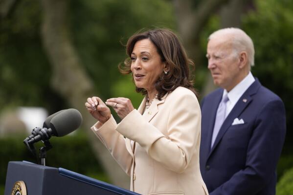 President Joe Biden listens as Vice President Kamala Harris speaks in the Rose Garden of the White House in Washington, Monday, May 1, 2023, about National Small Business Week. (AP Photo/Carolyn Kaster)