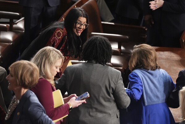 Sen. Rashida Tlaib, D-Mich., left, greets Rep. Nancy Pelosi, D-Calif., right, as the House of Representatives meets to elect a speaker and convene the new 119th Congress at the Capitol in Washington, Friday, Jan. 3, 2025. (AP Photo/Jacquelyn Martin)
