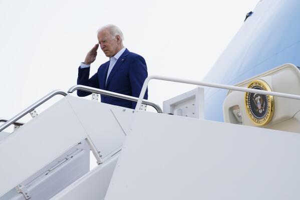 FILE - In this Monday, Sept. 13, 2021, file photo, President Joe Biden salutes before boarding Air Force One for a trip to visit the National Interagency Fire Center in Boise, Idaho, in Andrews Air Force Base, Md. On Friday, Sept. 17, 2021, The Associated Press reported on stories circulating online incorrectly asserting Biden had ordered the Department of Veterans Affairs to withhold health care benefits from unvaccinated veterans. “The President has not and will not withhold benefits to Veterans who choose not to be vaccinated,” Veterans Affairs Press Secretary Terrence L. Hayes said.  (AP Photo/Evan Vucci, File)