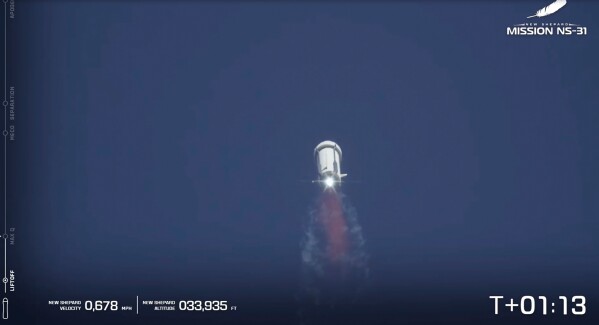 This image taken from video provided by Blue Origin shows the New Shepard rocket blasting off in West Texas, Monday, April 14, 2025. (Blue Origin via AP)