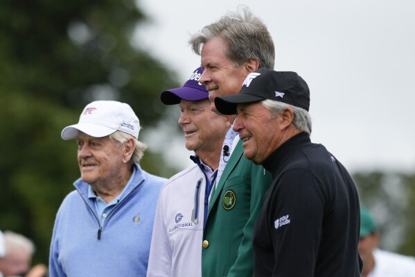 Augusta National chairman Fred S. Ridley, second from right, pose with honorary starters Jack Nicklaus, Tom Watson and Gary Player on the first hole hole during the first round at the Masters golf tournament at Augusta National Golf Club Thursday, April 11, 2024, in Augusta, Ga. (AP Photo/Matt Slocum)