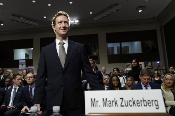 FILE - Meta CEO Mark Zuckerberg arrives to testify before a Senate Judiciary Committee hearing on Capitol Hill in Washington, Wednesday, Jan. 31, 2024. A New Mexico judge has granted Mark Zuckerberg's request to be dropped from a lawsuit that alleges his company has failed to protect young users from exposure to child sexual abuse material.(AP Photo/Susan Walsh, file)