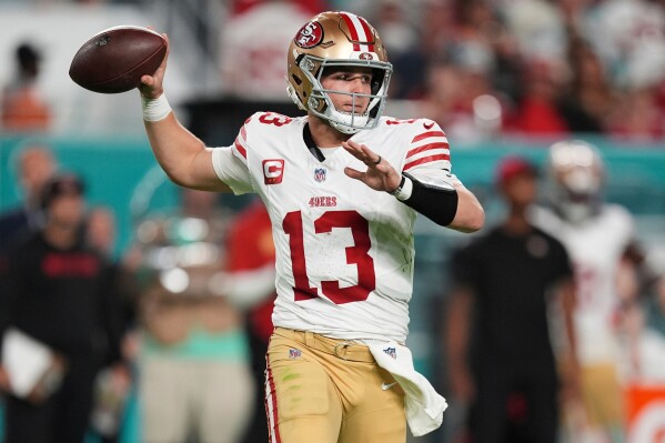 San Francisco 49ers quarterback Brock Purdy (13) aims a pass during the second half of an NFL football game against the Miami Dolphins, Sunday, Dec. 22, 2024, in Miami Gardens, Fla. (AP Photo/Rebecca Blackwell, File)