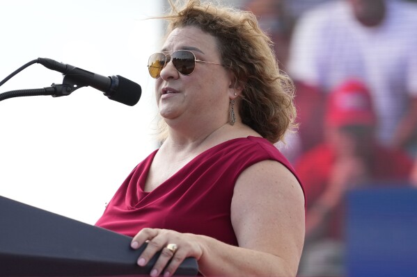 FILE - Wisconsin state Rep. Janel Brandtjen speaks as former President Donald Trump holds a campaign rally for Republican gubernatorial candidate Tim Michels at the Waukesha County Fairgrounds in Waukesha, Wis., on Aug. 5, 2022. The Wisconsin Ethics Commission is recommending that state prosecutors file felony charges against a fundraising committee for former President Donald Trump and Brandtjen, a Trump ally, related to an effort last year to unseat Assembly Speaker Robin Vos. (Mike De Sisti/Milwaukee Journal-Sentinel via AP, File)