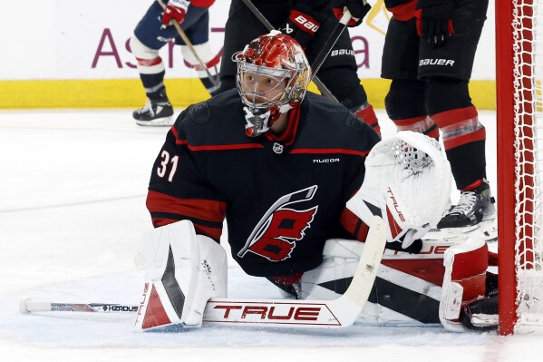 Carolina Hurricanes goaltender Frederik Andersen (31) watches the puck against the Washington Capitals during the third period of Game 3 of an NHL hockey Semi-final round playoff series in Raleigh, N.C., Saturday, May 10, 2025. (AP Photo/Karl DeBlaker)