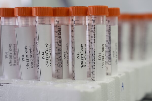 Vials containing samples of forever chemicals, known as PFAS, sit in a tray, April 10, 2024, at a U.S. Environmental Protection Agency lab in Cincinnati. (AP Photo/Joshua A. Bickel, File)