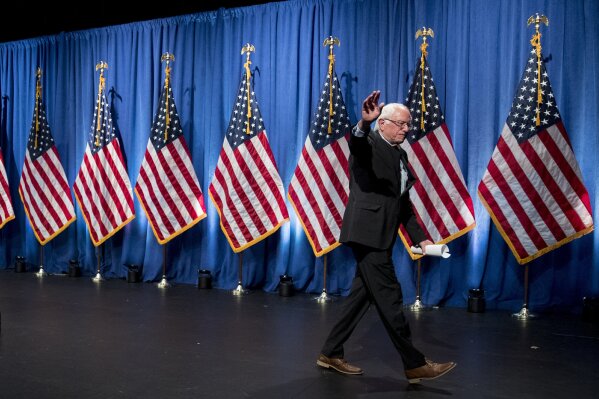 Democratic presidential candidate Sen. Bernie Sanders, I-Vt., departs after speaking at George Washington University in Washington, Wednesday, June 12, 2019, on his policy of democratic socialism, the economic philosophy that has guided his political career. (AP Photo/Andrew Harnik)