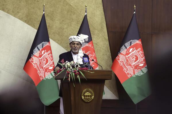 Afghan President Ashraf Ghani speaks at the extraordinary meeting of the Parliament in Kabul, Afghanistan, Monday, Aug. 2, 2021. (AP Photo/Rahmat Gul)