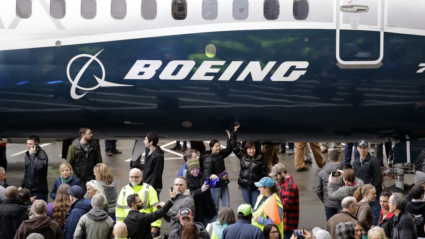 Boeing shareholders approve CEO's compensation as company faces ...