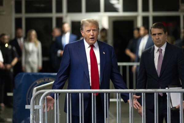 Former President Donald Trump speaks with the media as he leaves the courtroom following the day's proceedings in his trial at Manhattan criminal court in New York, Tuesday, April 30, 2024.  (Justin Lane/Pool Photo via AP)