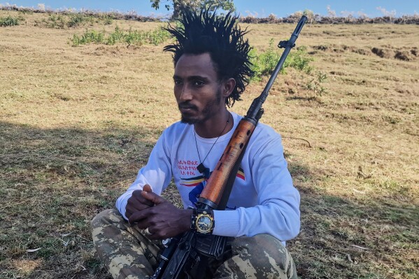 CORRECTS THE NAME OF THE REGION - Andarg Challe, 25, a Fano militia, poses for a photo in the Amhara region, Ethiopia, Monday, Jan. 24, 2025. (AP Photo)