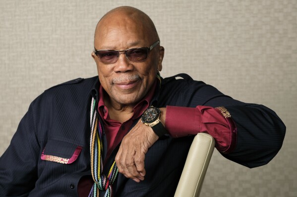 FILE - Music producer Quincy Jones poses for a portrait to promote his documentary "Quincy" during the Toronto Film Festival on Sept. 7, 2018, in Toronto. (Photo by Chris Pizzello/Invision/AP, File)