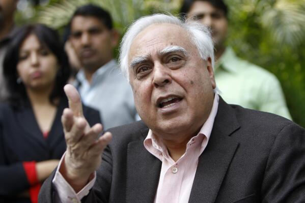 Indian Telecommunications Minister Kapil Sibal addresses a press conference in New Delhi, India, Tuesday, Dec. 6, 2011. Sibal said that Internet giants such as Facebook and Google have ignored his demands to screen derogatory material from their sites, so the government would have to take action on its own. The dispute highlights India's ongoing difficulty in balancing the Internet culture of freewheeling discourse with its homegrown religious and political sensitivities. (AP Photo/Gurinder Osan)