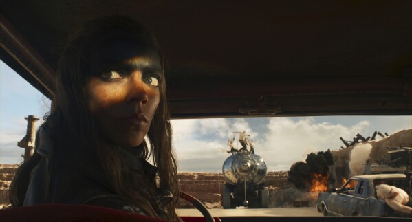 This image released by Warner Bros. Pictures shows Anya Taylor-Joy in a scene from "Furiosa: A Mad Max Saga." (Warner Bros. Pictures via AP)