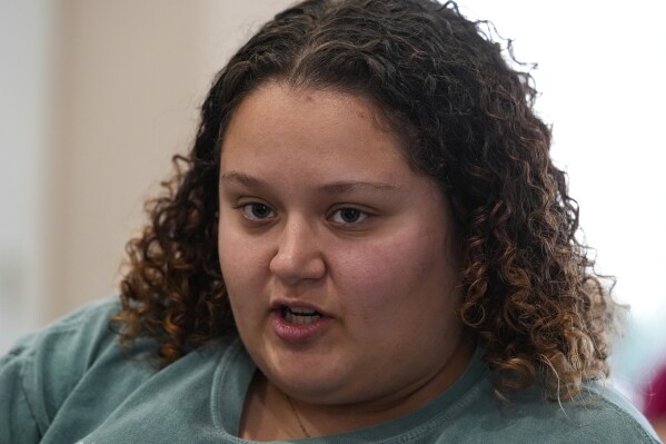 Maya Wasserman talks about her experiences on campus since the start of the conflict between Israel and Hamas during an interview at the Helene G. Simon Hillel Center at Indiana University in Bloomington, Ind., Tuesday, Feb. 13, 2024. An Indiana bill to address antisemitism on college campuses lost support from some members of the Jewish community after an amendment altered language surrounding criticism of Israel. (AP Photo/Michael Conroy)