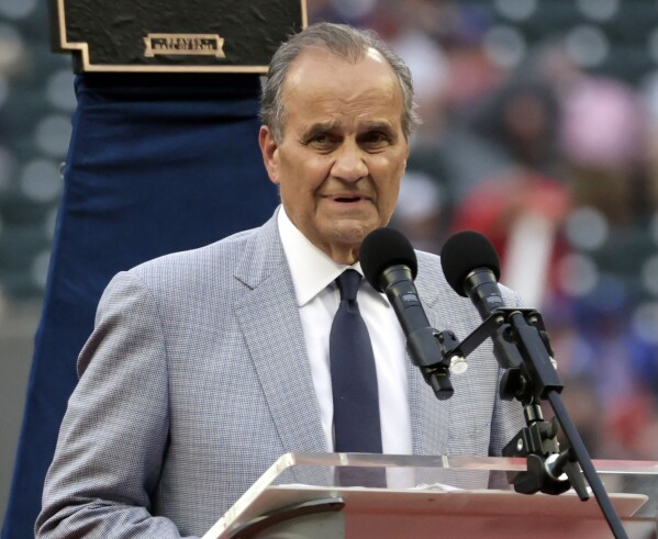 FILE - Joe Torre speaks as he is inducted into the Braves Hall of Fame before a baseball game between the Atlanta Braves and the Arizona Diamondbacks, July 30, 2022, in Atlanta. Torre was elected vice chairman of baseball’s Hall of Fame, Monday, March 11, 2024. The 83-year-old was elected to the Hall in 2014 and joined the board in 2023. (AP Photo/Butch Dill, File)