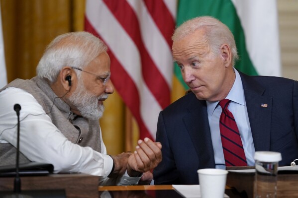 FILE - President Joe Biden speaks with India's Prime Minister Narendra Modi during a meeting in the East Room of the White House, Friday, June 23, 2023, in Washington. The U.S. has charged an Indian national in what prosecutors allege was a failed plot to assassinate a Sikh separatist at the behest of an unnamed Indian government official. The case is particularly sensitive given the high priority that President Joe Biden has placed on improving ties with India and courting it to be a major partner in the push to counter China's increasing assertiveness. (AP Photo/Evan Vucci, File)