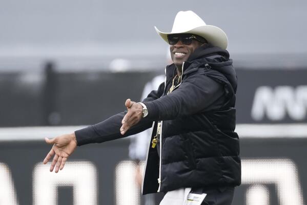 FILE - Colorado head coach Deion Sanders gestures in the first half of the team's spring practice NCAA college football game Saturday, April 22, 2023, in Boulder, Colo. The spring transfer window for college football players closed with 43 scholarship players -- the equivalent of half a roster -- from coach Deion Sanders' Colorado program having entered the portal since the spring game was played on April 15. (AP Photo/David Zalubowski, File)