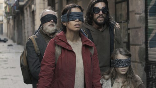 This image released by Netflix shows, from left, Gonzalo de Castro, Georgina Campbell, Mario Casas and Naila Schuberth in a scene from "Bird Box: Barcelona." (Andrea Resmini/Netflix via AP)